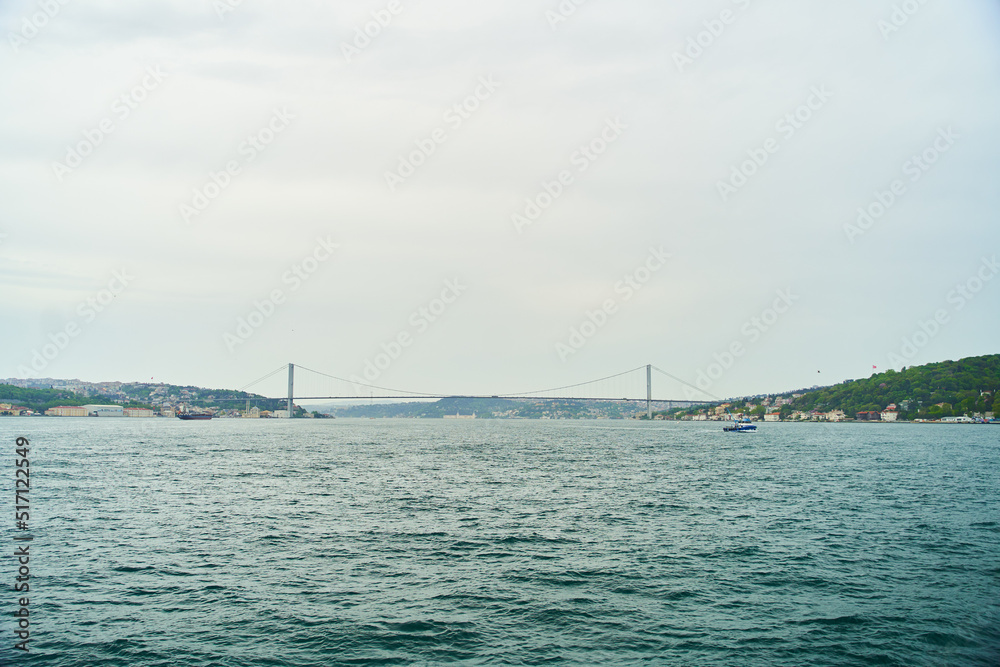 The Bosphorus Strait. View of the Bosphorus Bridge from afar in Istanbul, Turkey The Bosphorus Strait. View of the Bosphorus Bridge from afar in Istanbul, Turkey