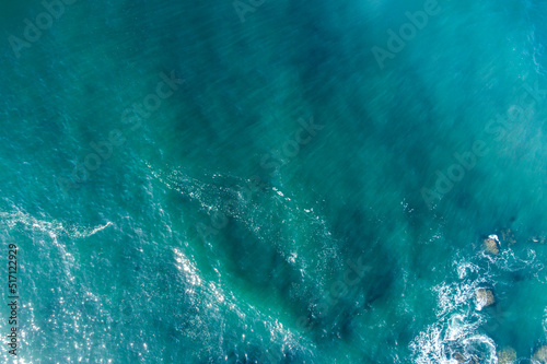 Aerial drone view of blue sea surface