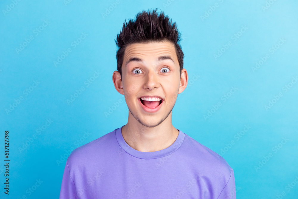 Portrait of positive impressed man open mouth scream incredible news isolated blue color background Portrait of positive impressed man open mouth scream incredible news isolated blue color background