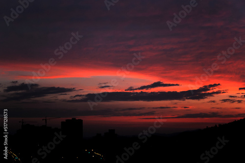 sun ray is go down and amazing dramatic orange cloud