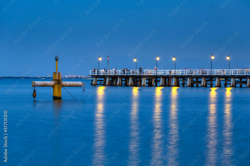 Baltic pier in Gdynia Orlowo at dusk, Poland