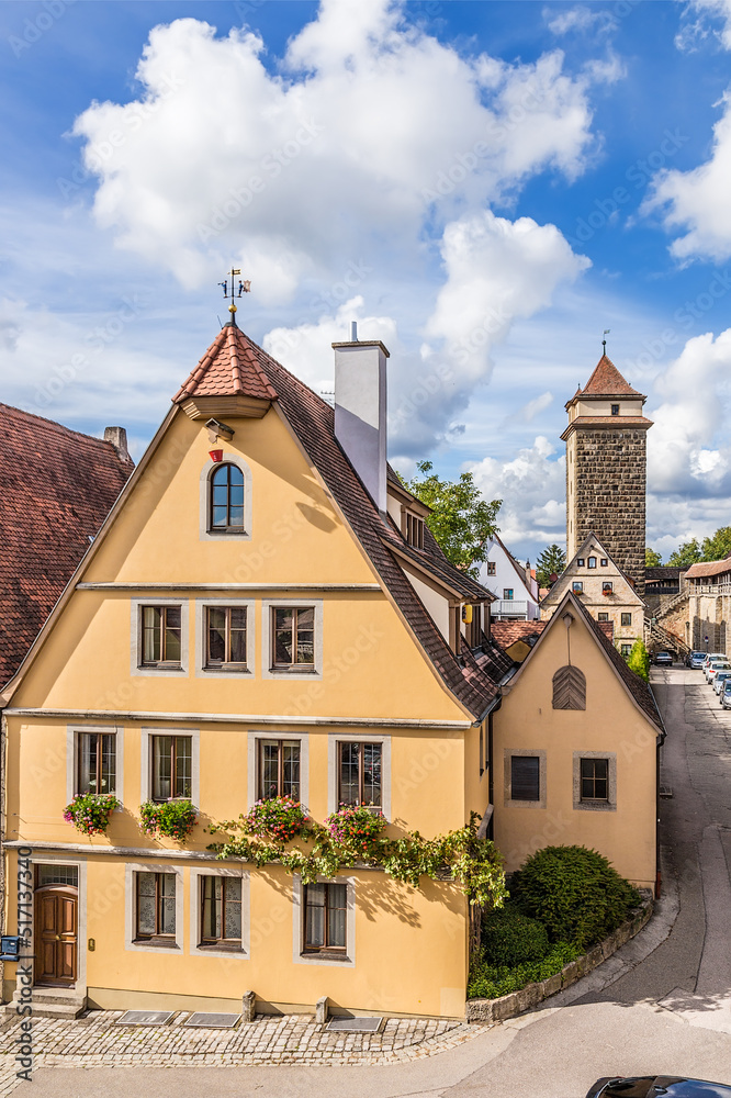 Rothenburg ob der Tauber, Germany. Fortress tower and old houses next to the city wall