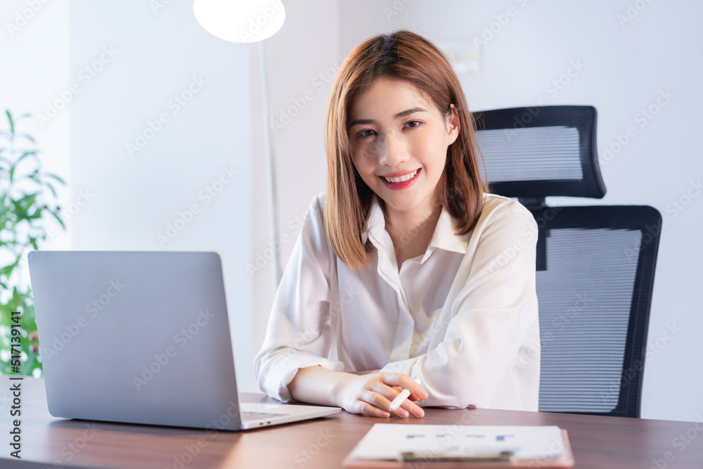 Portrait of young Asian businesswoman working Portrait of young Asian businesswoman working