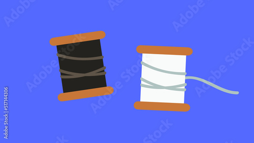Spools of white and black thread