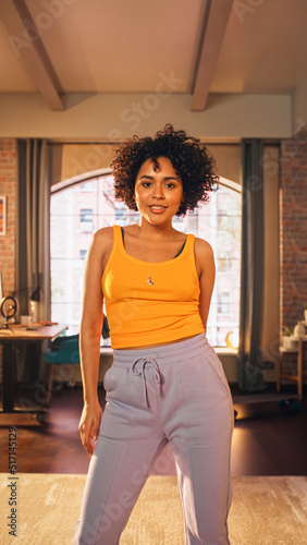 Vertical Screen: Beautiful Young Black Female Record a Dancing Routine on a Smartphone Video for Social Media. Stylish Latin Girl Streaming Her Choreography Online on Internet from Home.