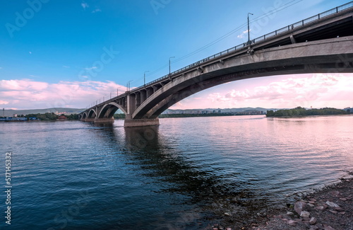 bridge over the river at sunset © Anatolii 