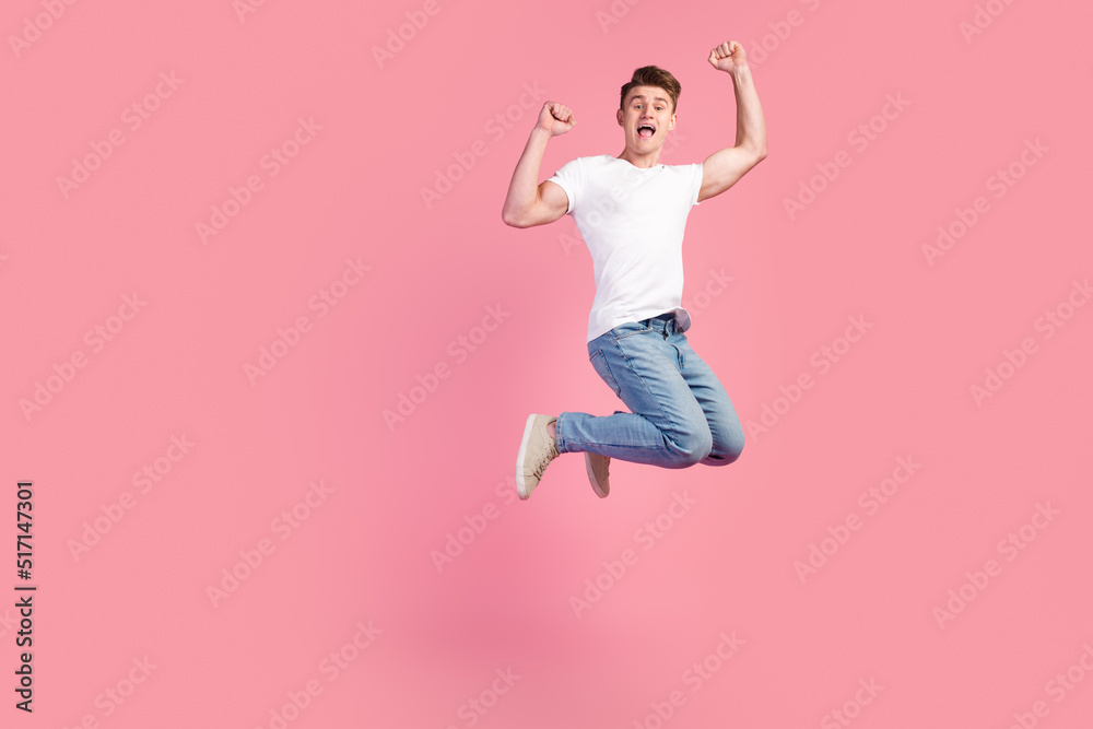 Full length photo of attractive crazy guy jump high supporting football team goal isolated pastel color background