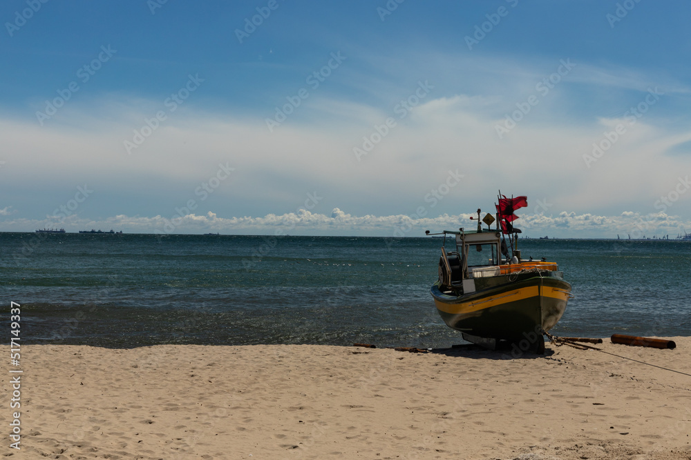Fishing boat on the beach in Gdynia Orlowo Fishing boat on the beach in Gdynia Orlowo