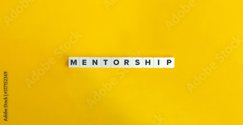 Mentorship Banner. Word on Letter Tiles on Yellow Background. Minimal Aesthetics.