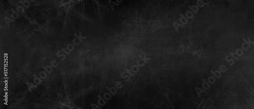 Fondo abstracto en colores muy oscuros, negros con textura rayada tonos grises neutros oscuros. Textura grunge, metálica. Espacio para texto o imagen