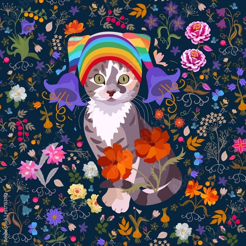 Kitty fashionista in knitted hat with pom-poms in form of bell flowers in front of flower bed on dark blue background. Seamless fabric print, pillow, napkin with symbol of Chinese year of the cat.