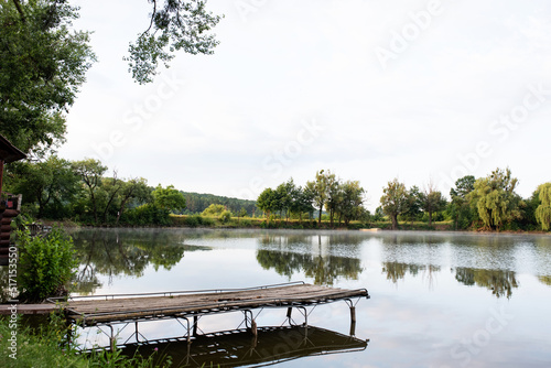 Morning fog over the lake in summer