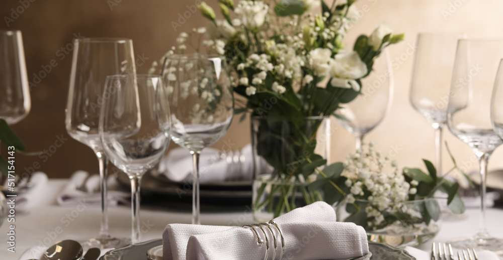 Stylish elegant table setting for festive dinner in restaurant. Banner design