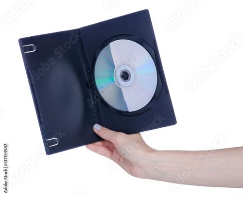 Hand holding DVD disk in box on white background isolation photo