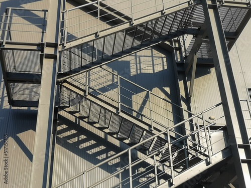 Close up of gray metal external emergency fire staircase. 
 photo