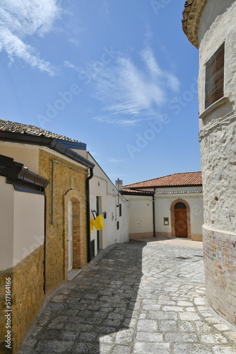 A street between the old houses of Tricarico, a rural village in the Basilicata region, Italy. © Giambattista