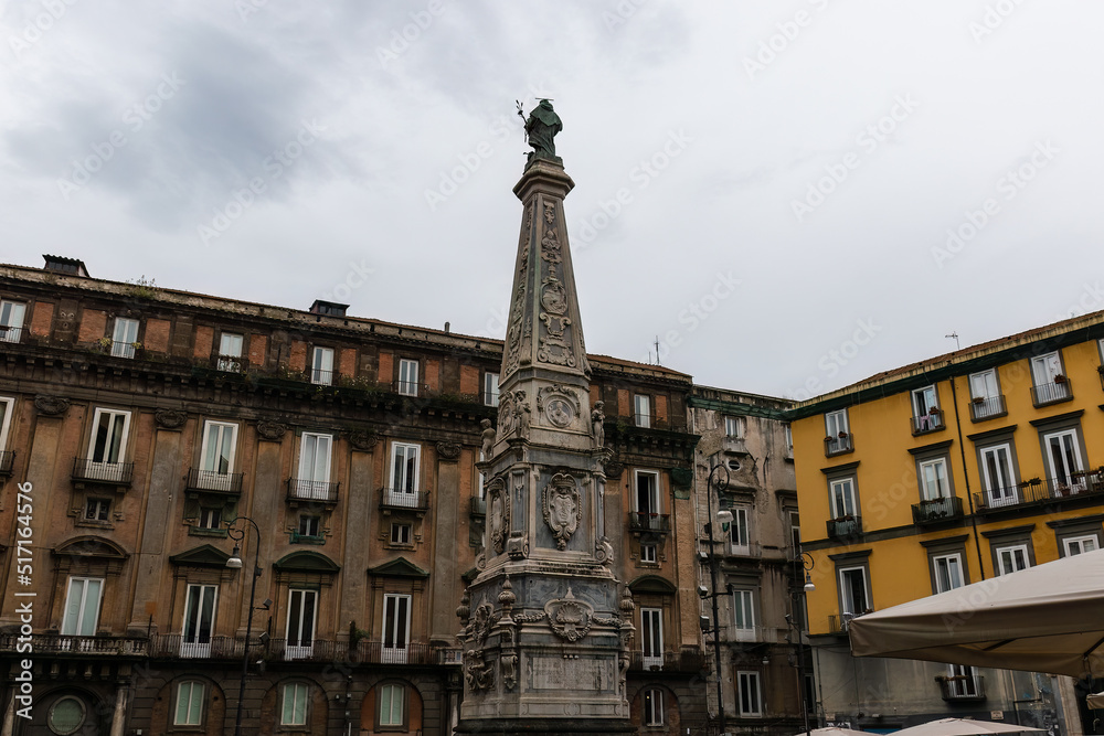 Spire of San Domenico, one of the three monumental columns (Spires of Naples) in the historic center of the city of Naples, Italy