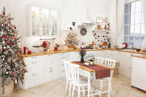 Christmas decoration on the kitchen. Kitchen interior holidays. New Year design.