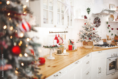 Christmas decoration on the kitchen. Kitchen interior holidays. New Year design.