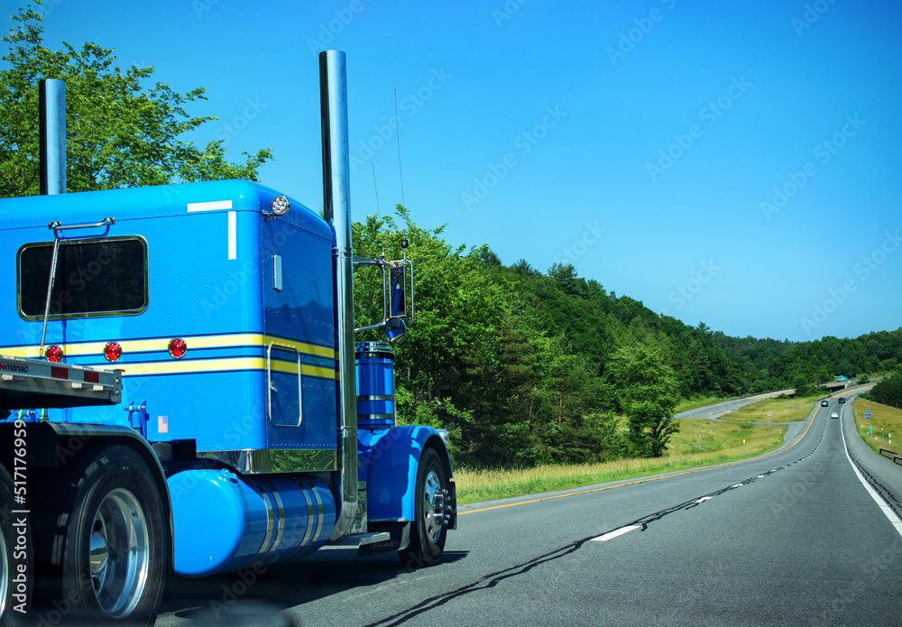 This Blue truck on the highway just happens to be the same color as the Sky Today.  Sky Blue truck on Route 17 in Windsor in Upstate NY.