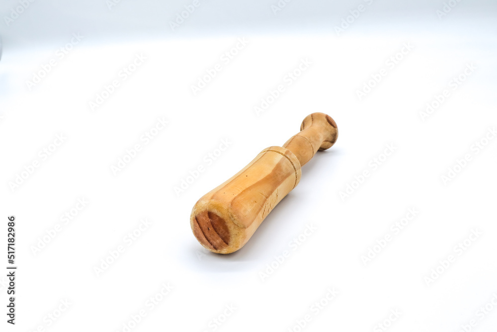 wooden mortar on white background