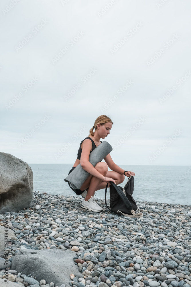 sport fit outdoor sea.girl goes sports,fitness,yoga seashore.Meditation, relaxation, mental health.Active lifestyle, self-care, health.Wellness.Fit nature.myofascial release workouts tracking fitness sport fit outdoor sea.girl goes sports,fitness,yoga seashore.Meditation, relaxation, mental health.Active lifestyle, self-care, health.Wellness.Fit nature.myofascial release workouts tracking fitness