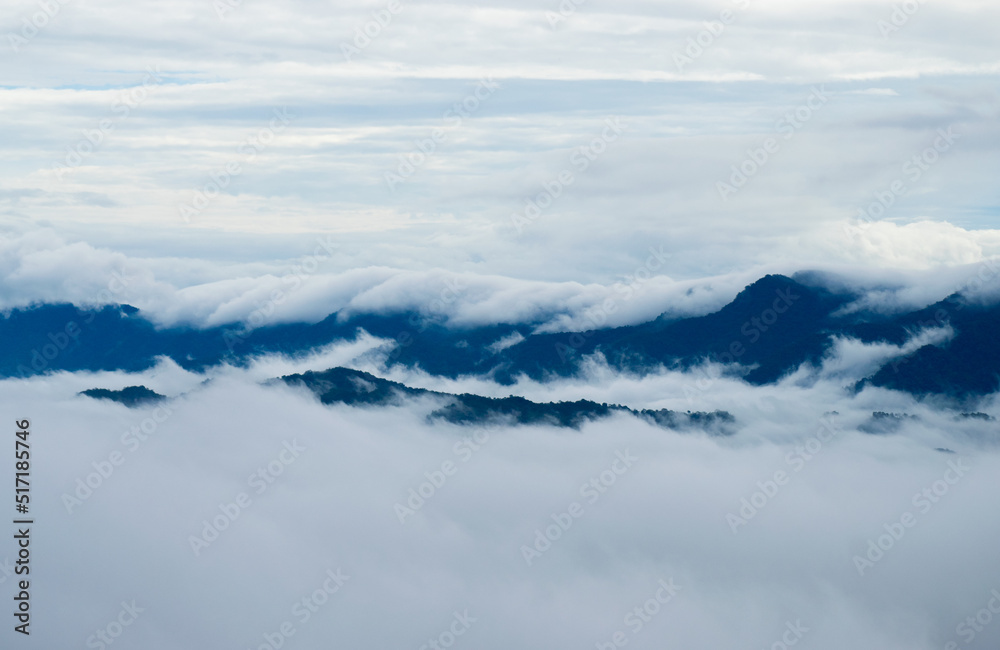 landscape with peaks covered by snow and clouds, mountains covered with white clouds landscape with peaks covered by snow and clouds, mountains covered with white clouds