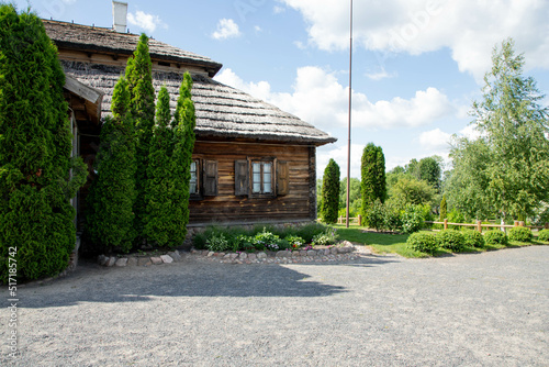 Historic Slavic dwelling on the Molpir hill in the Little Carpathians. Two wooden cottages with straw roof on the hillfort.