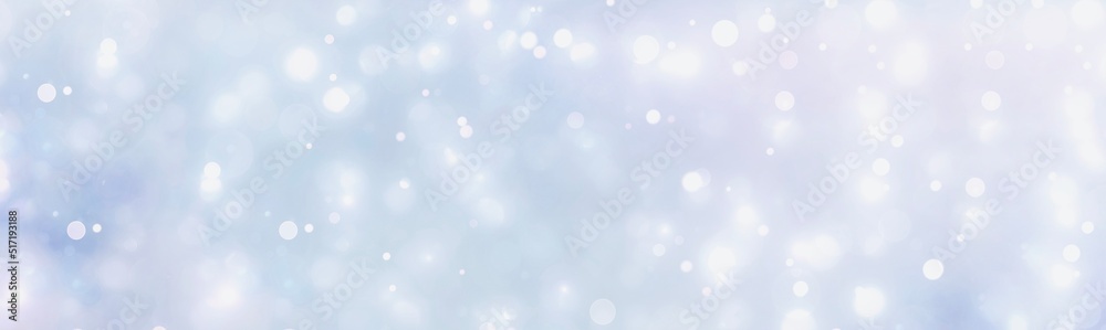 Christmas Winter abstract blue bokeh background banner - New year wintry snow blurred lights - Beautiful holiday panorama
