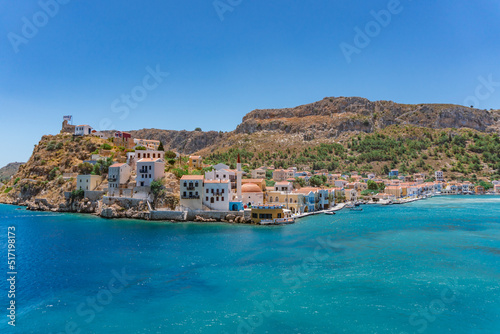Aerial view of Kastellorizo Island, Greece. Beautiful blue ocean and colorful houses at the coast.