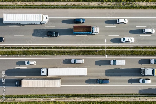 Aerial drone photograph of traffic jam on a multi lane highway with motion blur effect. photo