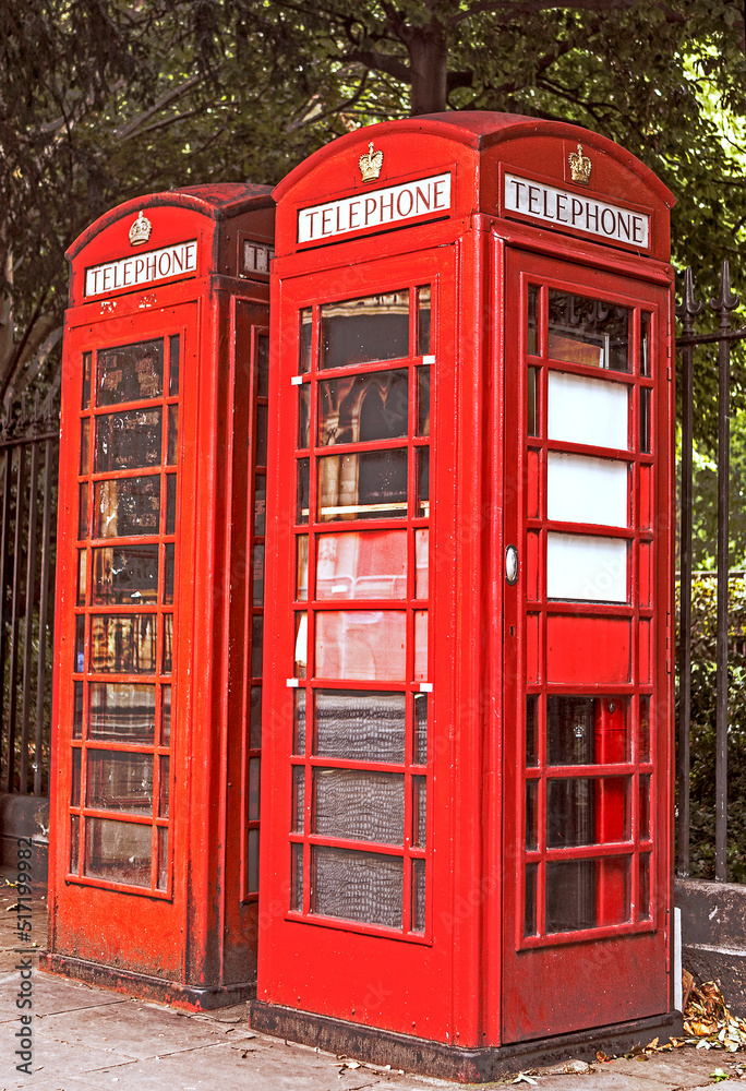 photograph of a red telephone booth in London photograph of a red telephone booth in London