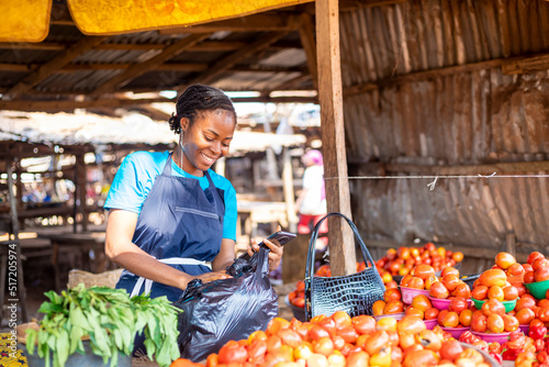 african market woman shopping from local market