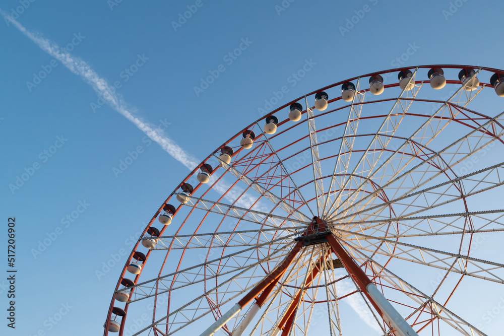 ferris wheel on a blue sky