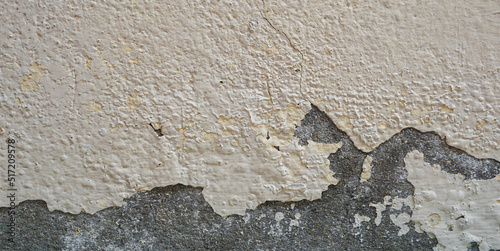 Old wall with cement surface crack. Wall color paint surface crack. Old cement wall abstract background.