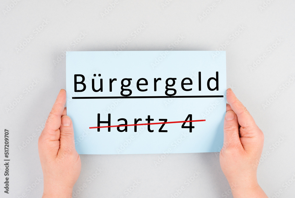 The german word for citizen money is standing on a paper, Hartz 4 is crossed out, new financial help system for unemployment in Germany, social issue The german word for citizen money is standing on a paper, Hartz 4 is crossed out, new financial help system for unemployment in Germany, social issue