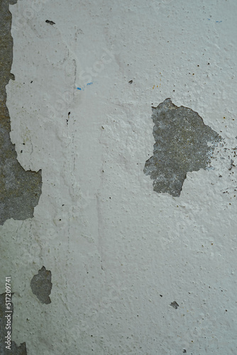 Old wall with cement surface crack. Wall color paint surface  crack. Old cement wall abstract background.