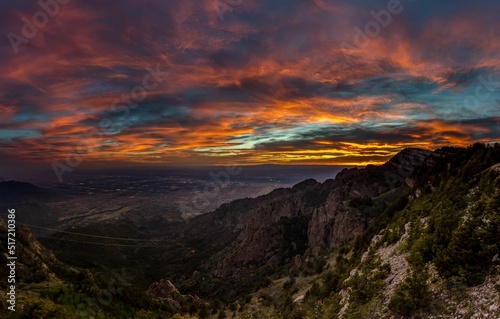 Breathtaking sunset view over Albuquerque, New Mexico from the Sandia Peak Tramway photo