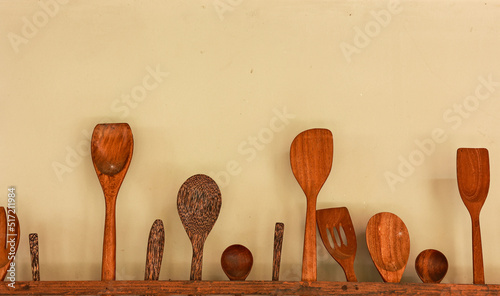 Wooden kitchen utensils with white background. Home decoration concept.