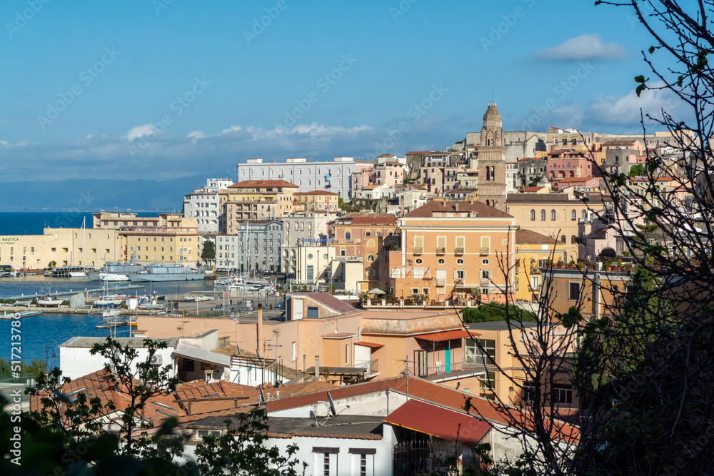 Walking in historical town Gaeta, summer vacation destination on Tyrrhenien sea with sandy beaches and old houses