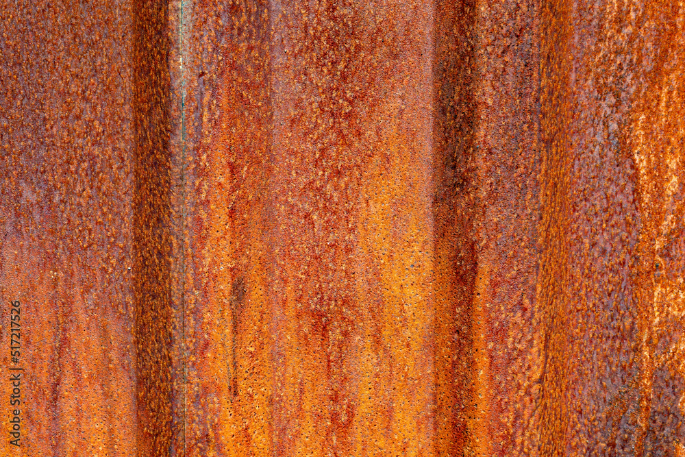 Rust on a metallic red texture