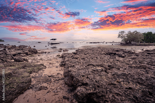 Wallpaper Mural Beautiful landscape with colorful sunset on the low tide tropical beach