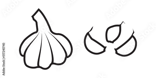 Vector icon of Bulb of garlic and separated cloves black and white