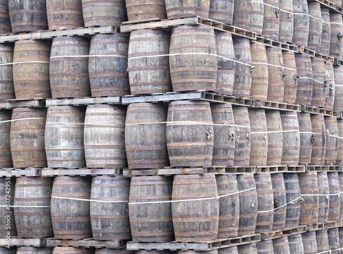 Whisky casks stacked at distillery for storage