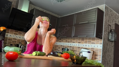 girl cutting salad in the kitchen