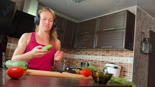 girl cutting salad in the kitchen