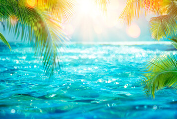 Abstract Summer - Blurred Sea With Leaves Palm And Defocused Bokeh Lights On Ocean