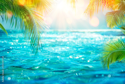 Abstract Summer - Blurred Sea With Leaves Palm And Defocused Bokeh Lights On Ocean © Romolo Tavani