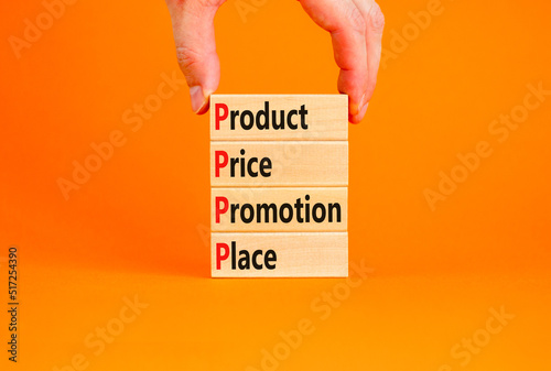 PPPP product price promotion place symbol. Concept words PPPP product price promotion place on wooden blocks on beautiful orange background. Business and PPPP product price promotion place concept. photo