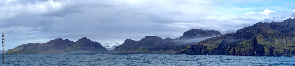 Panorama of a the Atlantic coastline below the mountains at Leith Harbor, South Georgia Island